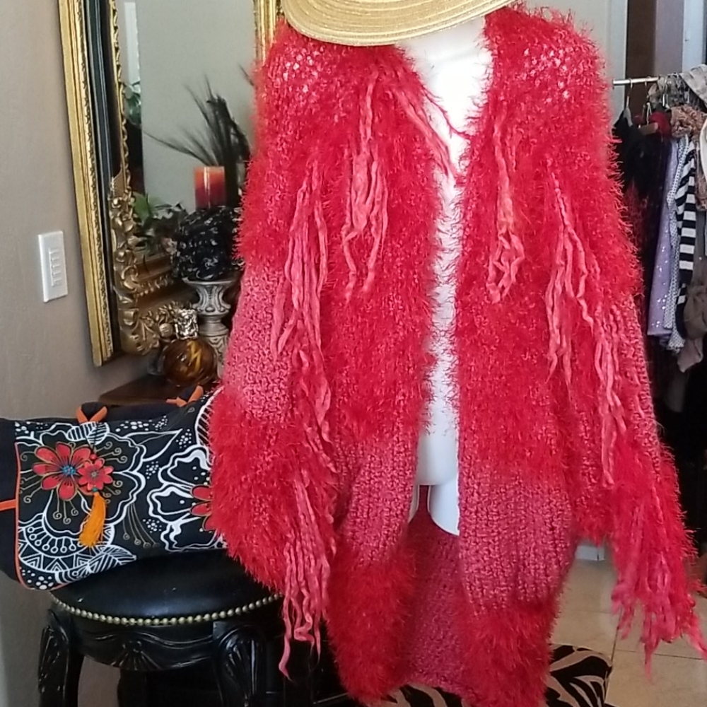 Lady in RED.... Original hand knit one size fringed sweater. Open knit design.